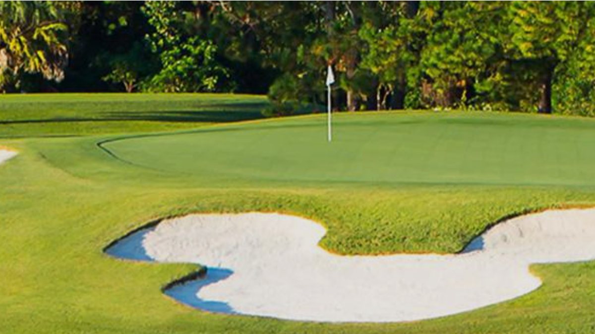 Mickey-shaped bunker beside a green at Disney's Magnolia, one of the best golf courses in Orlando