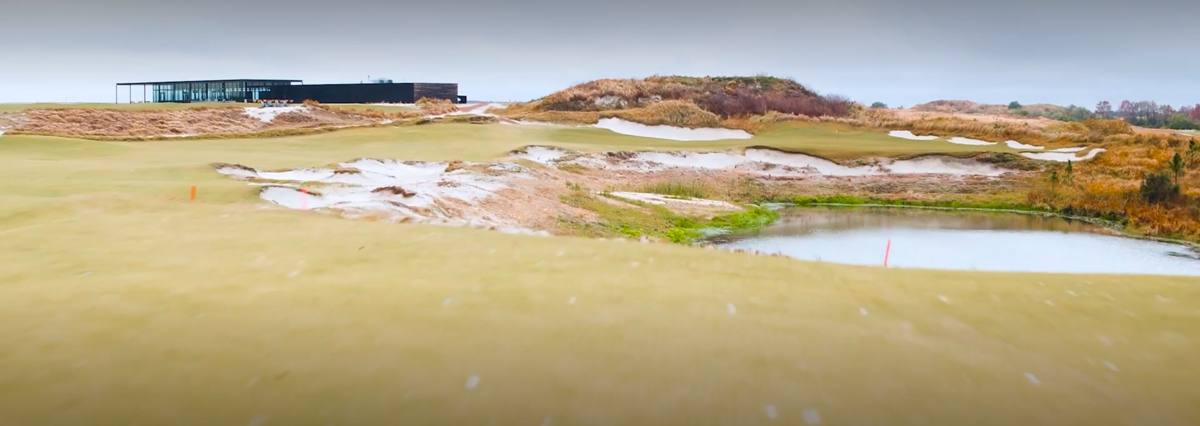 Sandy waste bunkers, dunes and a pond at Streamsong, our top pick among the best golf courses in Florida