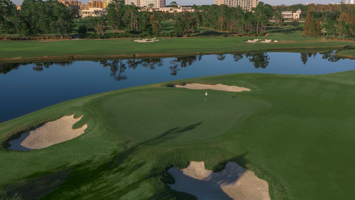 Lake and bunkered green at Waldorf Astoria Golf Club, among the best golf courses in Orlando