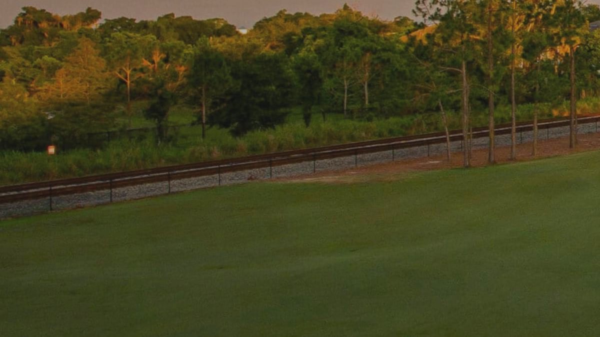 Fairway beside the railway at Winter Park Golf Course WP9, a cheap nine-hole course near Orlando